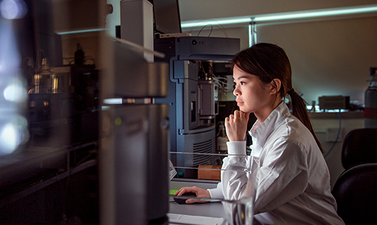 Scientist working at a computer Scientist working at a computer