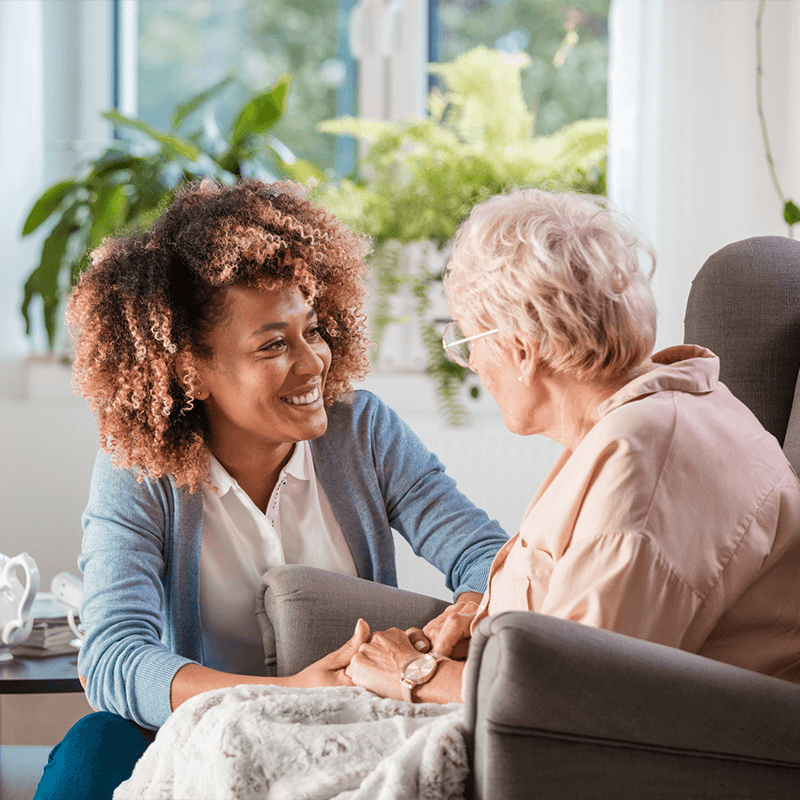 Care worker helping a patient
